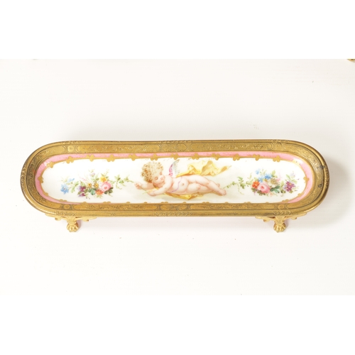 32 - A 19TH CENTURY FRENCH SERVES STYLE PORCELAIN AND ORMOLU MOUNTED DESK SET comprising of a letter rack... 