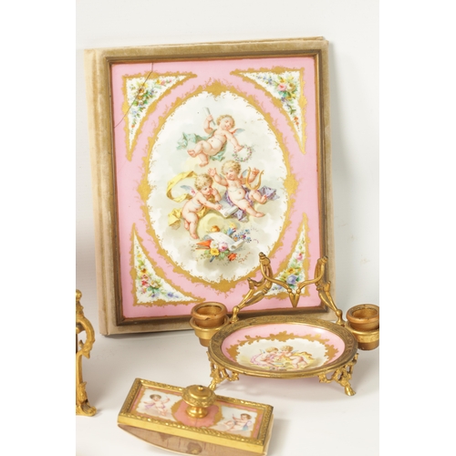 32 - A 19TH CENTURY FRENCH SERVES STYLE PORCELAIN AND ORMOLU MOUNTED DESK SET comprising of a letter rack... 