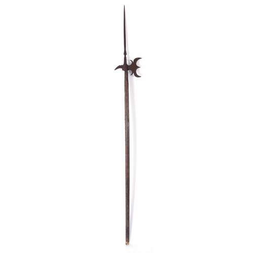 320 - A LATE 16TH/ EARLY 17TH CENTURY GERMAN HALBERD the riveted iron axehead with long spike on pine shaf... 