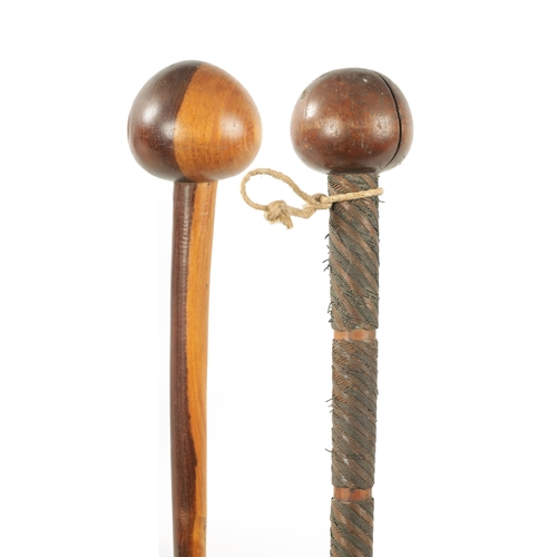 323 - TWO 19TH CENTURY AFRICAN HARDWOOD KNOBKERRI one with bound wirework decoration to the stem. (73cm an... 