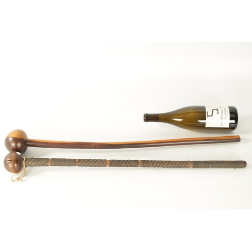 323 - TWO 19TH CENTURY AFRICAN HARDWOOD KNOBKERRI one with bound wirework decoration to the stem. (73cm an... 