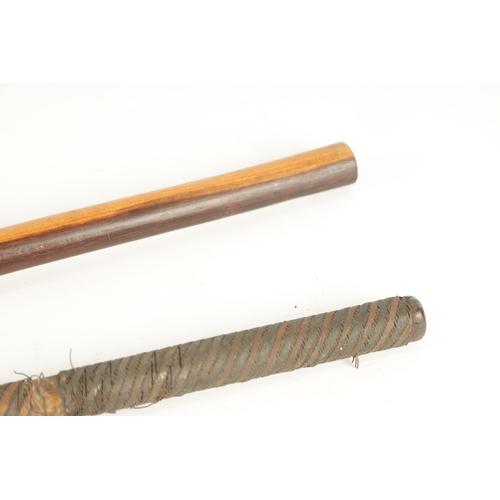 323 - TWO 19TH CENTURY AFRICAN HARDWOOD KNOBKERRI one with bound wirework decoration to the stem. (73cm an... 