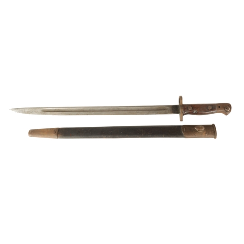 325 - A 1907 PATTERN WW1 BAYONET with single-edged fullered steel blade and brass guard on a wooden handle... 