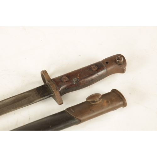 325 - A 1907 PATTERN WW1 BAYONET with single-edged fullered steel blade and brass guard on a wooden handle... 