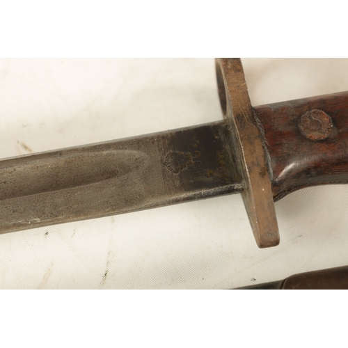 325 - A 1907 PATTERN WW1 BAYONET with single-edged fullered steel blade and brass guard on a wooden handle... 