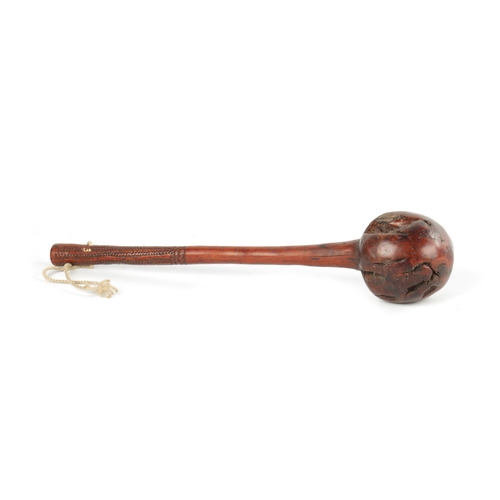 329 - A 19TH CENTURY ROOT HARDWOOD KNOBKERRIE with carved wriggle work handle. (40cm overall )