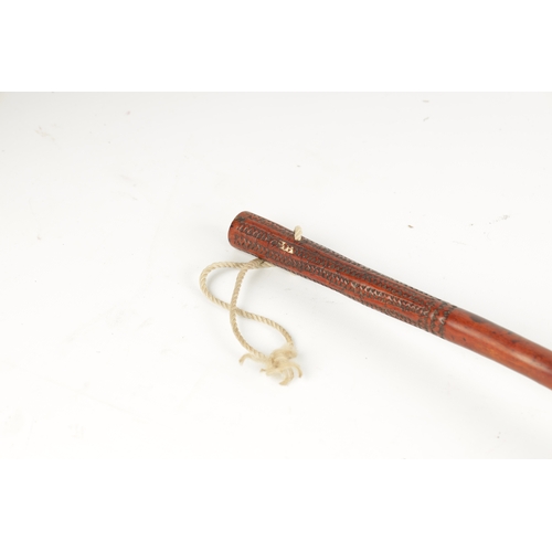 329 - A 19TH CENTURY ROOT HARDWOOD KNOBKERRIE with carved wriggle work handle. (40cm overall )