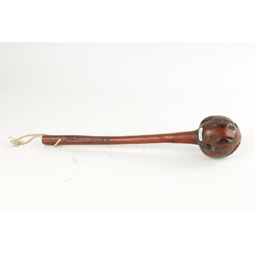 329 - A 19TH CENTURY ROOT HARDWOOD KNOBKERRIE with carved wriggle work handle. (40cm overall )