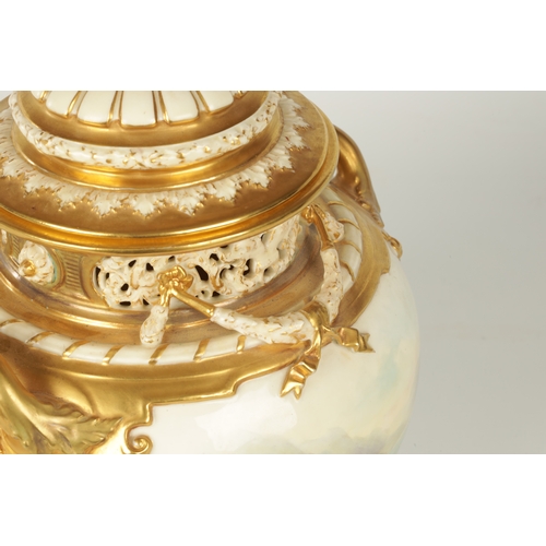 33 - JOHN STINTON. A FINE RICHLY GILT, RELIEF MOULDED TWO HANDLED BULBOUS BLUSHED IVORY POT POURRI CABINE... 