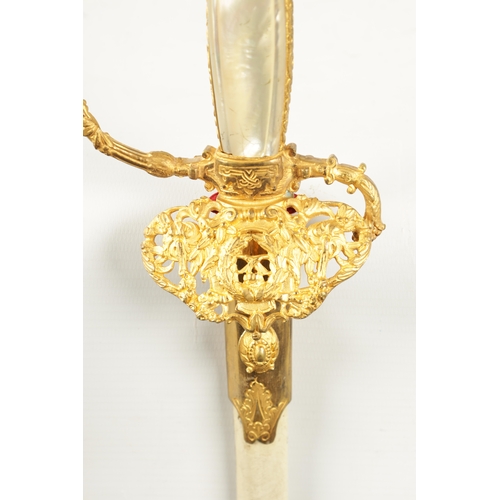 331 - AN EARLY 20TH CENTURY CIVIL SERVANT SWORD POSSIBLY VENEZUELAN with finely cast gilt knuckle guard, h... 