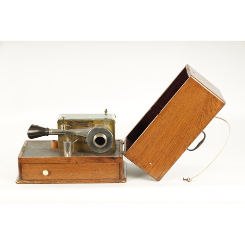 333 - AN UNUSUAL LATE 19TH / EARLY 20TH CENTURY SCIENTIFIC INSTRUMENT with clockwork movement and oak carr... 