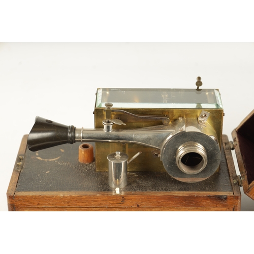 333 - AN UNUSUAL LATE 19TH / EARLY 20TH CENTURY SCIENTIFIC INSTRUMENT with clockwork movement and oak carr... 