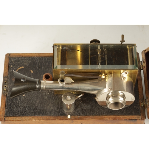 333 - AN UNUSUAL LATE 19TH / EARLY 20TH CENTURY SCIENTIFIC INSTRUMENT with clockwork movement and oak carr... 