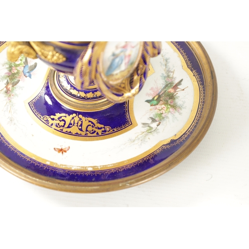 39 - A LATE 19TH CENTURY FRENCH SEVRES TYPE ORMOLU MOUNTED AND JEWELLED PORCELAIN INKWELL the central ves... 