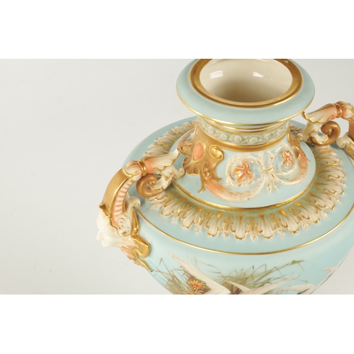 47 - C.H.C. BALDWYN A FINE ROYAL WORCESTER PEDESTAL CABINET VASE AND COVER the richly gilt and pink tinte... 