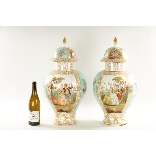 48 - A IMPRESSIVE LARGE PAIR OF LATE 19TH CENTURY DRESDEN PORCELAIN HALL VASES AND COVERS the shouldered ... 