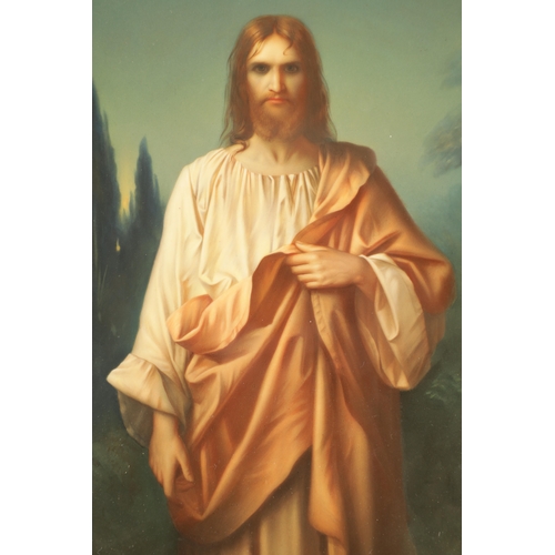 53 - A 19TH CENTURY GERMAN ‘KPM’ PORCELAIN PLAQUE OF CHRIST depicted three quarter length within Cyprus f... 