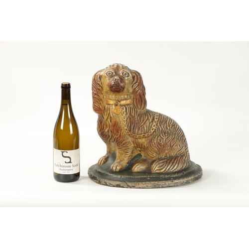 60 - A LARGE 19TH CENTURY SALT GLAZE SCULPTURE OF A SPANIEL seated on a green moulded oval base (35cm hig... 