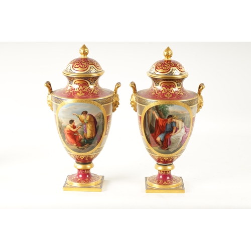 61 - A FINE PAIR OF VIENNA PORCELAIN URN SHAPED LIDDED VASES with floral gilt decoration surrounding oval... 