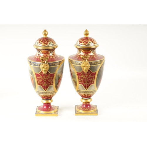 61 - A FINE PAIR OF VIENNA PORCELAIN URN SHAPED LIDDED VASES with floral gilt decoration surrounding oval... 