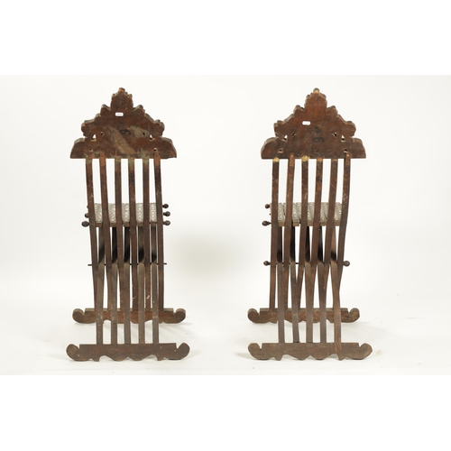 67 - A PAIR OF 19TH CENTURY ISLAMIC OTTOMAN HARDWOOD AND MOTHER OF PEARL INLAID FOLDING CHAIRS with shape... 