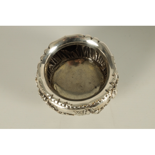 68 - A JAPANESE MEIJI PERIOD SOLID SILVER IRIS BOWL the scalloped flared rim above a footed bulbous body ... 