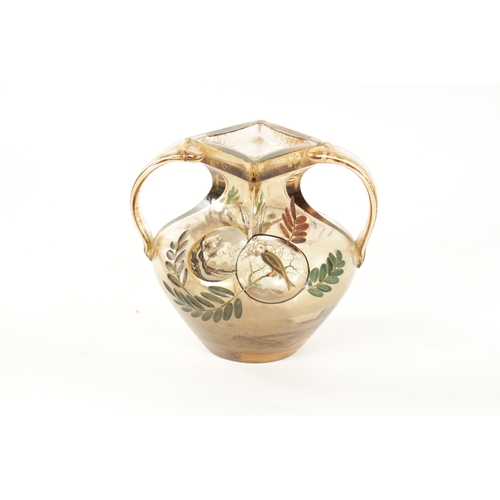 7 - EMILE GALLE. A LATE 19TH CENTURY SMOKED GLASS TWO-HANDLED VASE the shouldered body with gilt handles... 