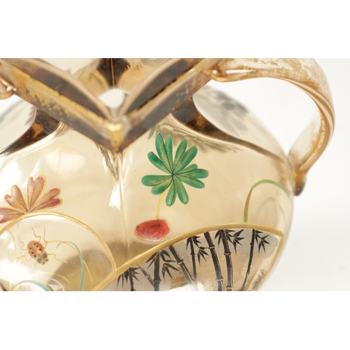 7 - EMILE GALLE. A LATE 19TH CENTURY SMOKED GLASS TWO-HANDLED VASE the shouldered body with gilt handles... 