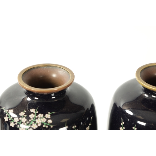 71 - A PAIR OF JAPANESE MEIJI PERIOD VASES on dark blue ground decorated with birds under flowers and blo... 