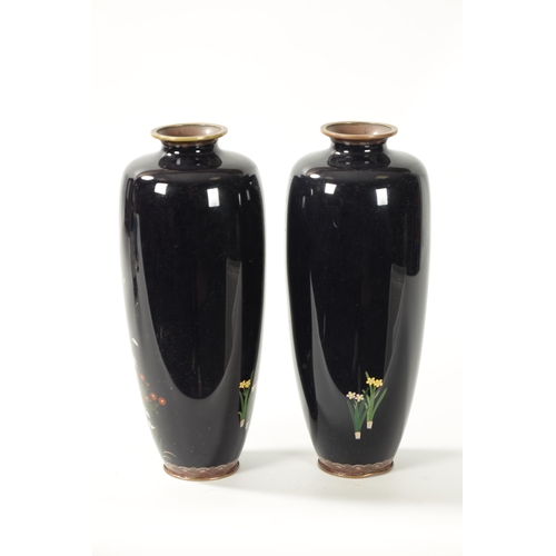 71 - A PAIR OF JAPANESE MEIJI PERIOD VASES on dark blue ground decorated with birds under flowers and blo... 