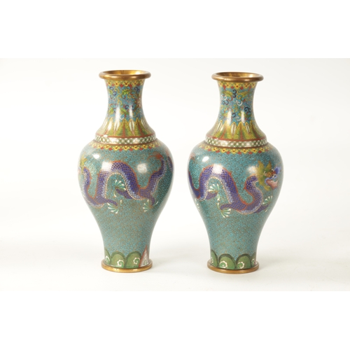 73 - A PAIR OF 20TH CENTURY CHINESE CLOISONNÉ ENAMEL VASES having finely decorated dragons and floral ban... 