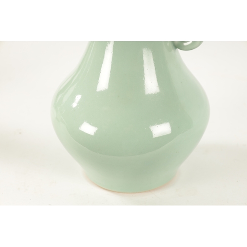 76 - A LARGE JAPANESE MEIJI PERIOD PALE GREEN CELADON GLAZE VASE BY MAKUZU KOZAN of slightly flared bulbo... 