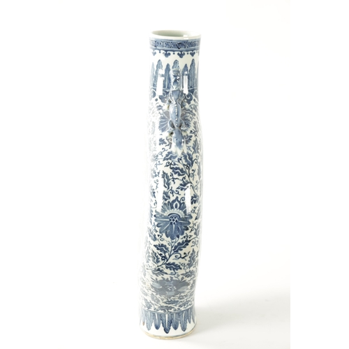 86 - A 19TH CENTURY OVER-SIZED CHINESE BLUE AND WHITE MOON FLASK with dragon handles and foliated border ... 