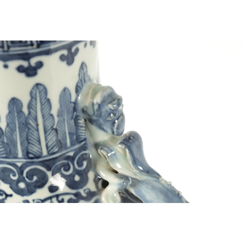 86 - A 19TH CENTURY OVER-SIZED CHINESE BLUE AND WHITE MOON FLASK with dragon handles and foliated border ... 