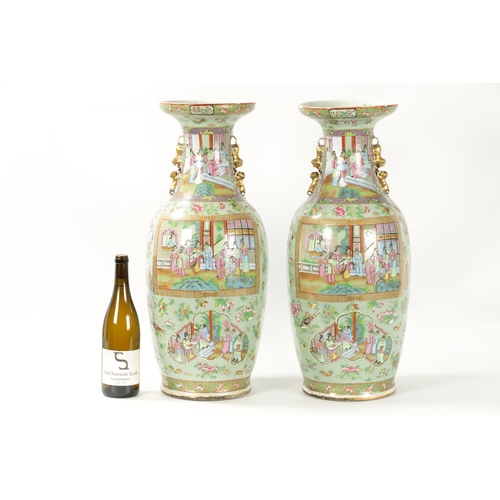 89 - A GOOD PAIR OF 19TH CENTURY CELADON GROUND CANTONESE SLENDER SHOULDERED OVOID VASES the shallow rais... 