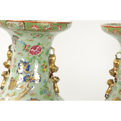 89 - A GOOD PAIR OF 19TH CENTURY CELADON GROUND CANTONESE SLENDER SHOULDERED OVOID VASES the shallow rais... 