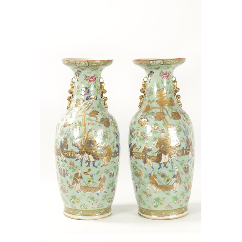 89 - A GOOD PAIR OF 19TH CENTURY CELADON GROUND CANTONESE SLENDER SHOULDERED OVOID VASES the shallow rais... 