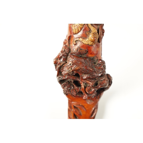 92 - AN EARLY 20TH CENTURY CHINESE CARVED ROOT WOOD WALKING STICK decorated with a figural head handle, b... 