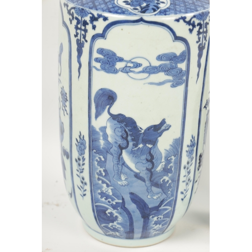 95 - A 19TH CENTURY BLUE AND WHITE CHINESE VASE the slightly tapered body with panelled decoration of flo... 