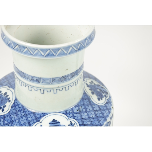 95 - A 19TH CENTURY BLUE AND WHITE CHINESE VASE the slightly tapered body with panelled decoration of flo... 