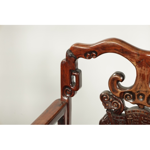 99 - A GOOD PAIR OF 19TH CENTURY CHINESE HARDWOOD OPEN ARMCHAIRS the shaped geometric backs with ornate c... 