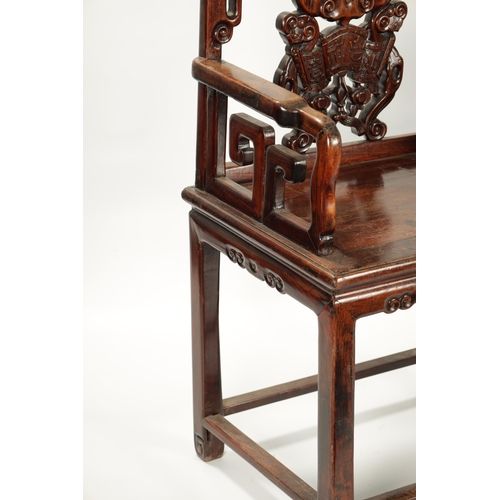 99 - A GOOD PAIR OF 19TH CENTURY CHINESE HARDWOOD OPEN ARMCHAIRS the shaped geometric backs with ornate c... 