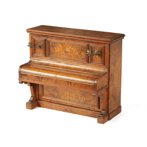 336 - A 19TH CENTURY FIGURED WALNUT CIGAR COMPENDIUM FORMED AS AN UPRIGHT PIANO decorated with marquetry p... 