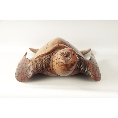 341 - A LARGE HARDWOOD LIFE-SIZE CARVED SCULPTURE modelled as a Hawksbill turtle (81cm long)