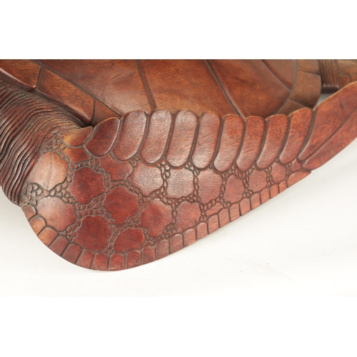 341 - A LARGE HARDWOOD LIFE-SIZE CARVED SCULPTURE modelled as a Hawksbill turtle (81cm long)