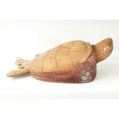 341 - A LARGE HARDWOOD LIFE-SIZE CARVED SCULPTURE modelled as a Hawksbill turtle (81cm long)