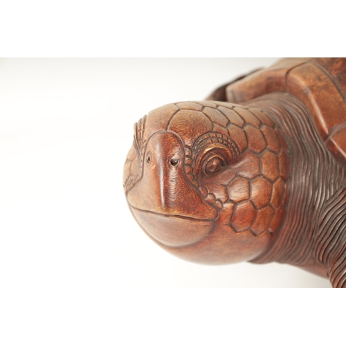 341 - A LARGE HARDWOOD LIFE-SIZE CARVED SCULPTURE modelled as a Hawksbill turtle (81cm long)