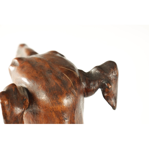 351 - A GOOD 19TH CENTURY CARVED WALNUT OVER-SIZED SCULPTURE OF A SEATED GREYHOUND on a tiered rectangular... 