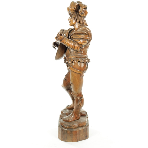 354 - A GOOD 19TH CENTURY BLACK FOREST CARVED LINDEN WOOD FIGURE OF A MUSICIAN depicting a lute player on ... 