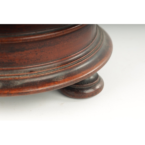 358 - AN 18TH CENTURY MAHOGANY TREEN WARE LIDDED BOX with turned lid fitted acorn shaped handle; raised on... 